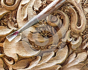 Wood carvings, tools and processes work closeup