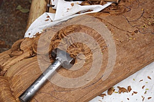 A wood carvings, tools and processes work closeup.