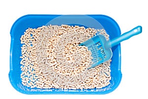 Wood cat litter on a white background. Pets Article about the cat`s toilet and the smell from it. Cat odor neutralizer
