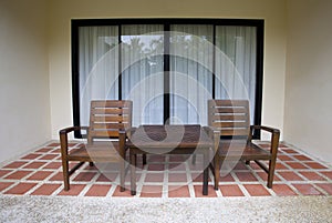 Wood chairs at home terrace
