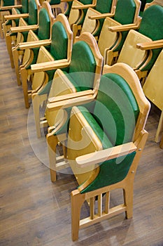 Wood chairs rows on a parquet floor