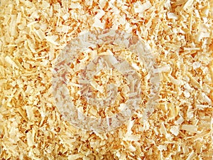 Wood chips background, texture, yellow, close-up, from top