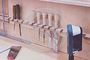 Wood chisels and rulers. Carpentry tools for woodworking in a carpentry workshop