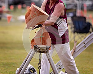 A Wood Chopper Competing In An Event At A Country Show