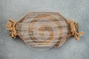 Wood chopping or serving food on a gray background. Long banner format. top view