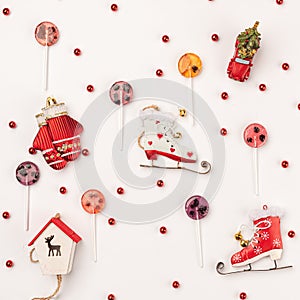 Wood christmas background with christmas gifts and candy cane, top view