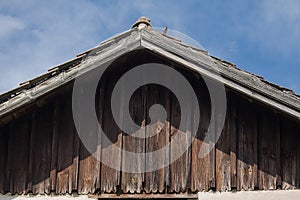 Wood-clad house gable.