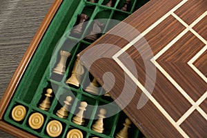 Wood complete set of a strategy game with pawns and chess