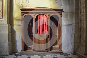 Confessional in Catholic church photo