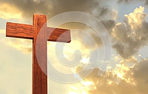 Wood Cross on a mountain top with beautiful sunset sky