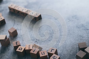 Wood cube letter word of SUCCESS and failure. Idea of motivation or inspiration in business vision and corporate management