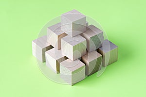 Wood cubes arranged in pattern geometric