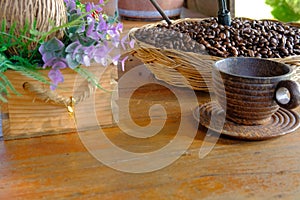 wood cup coffee bean & decorative flower bouquet