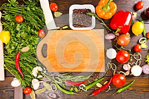 Wood Cutting Board with Fresh Herbs and Vegetables