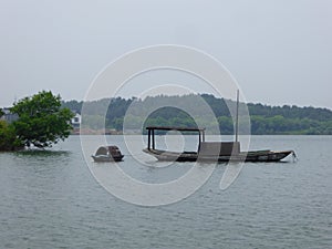 Wood cutting parked on the water