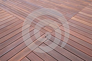 Wood decking construction with boards in different direction