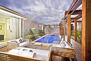 Wood decorated swimming pool area with swimming pool