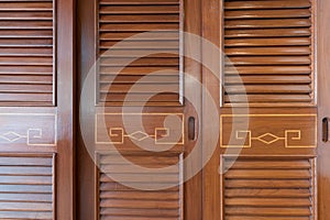 Wood door of an armoire background