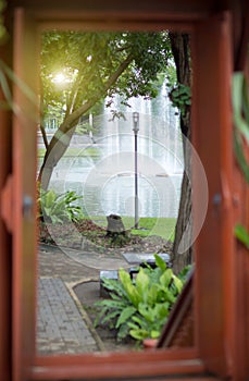 wood door frame, see through in the garden. interior architecture for house and building.