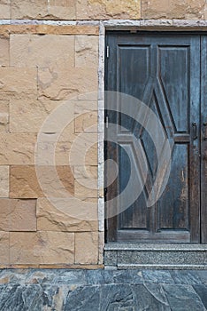 Wood door in old stone house