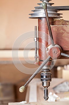 Wood driller in workshop