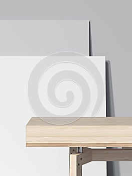 Wood empty table and two blank picture frames. 3d rendering