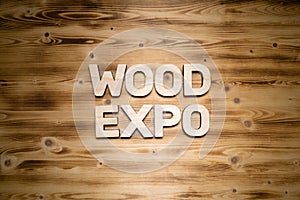 WOOD EXPO words made of wooden block letters on wooden board