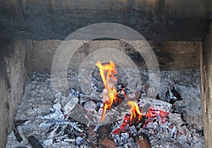 WOOD FIRE WITH ASHES, EMBERS AND FLAMES