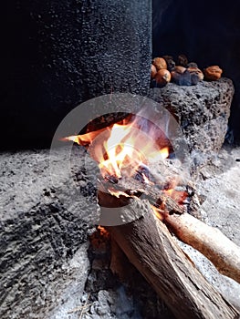 Wood and fire for cooking in the village.