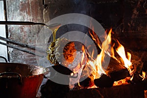 Wood-fired spit-roasted cake, Pyrenees-Atlantique, France photo