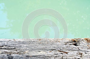 Wood floor on blur of pastel color water,  background - can used for display or montage your products Selected focus empty brown w