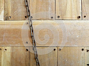 Wood floor surface w/ chain