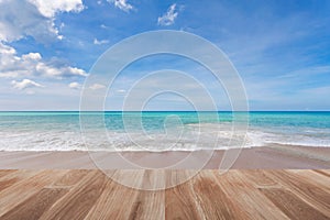 Wood floor on tropical beach scenery background.