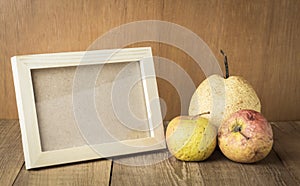 Wood frame with space and sear fruit