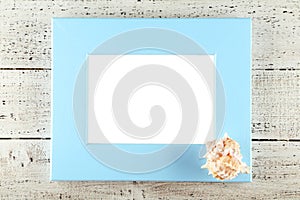 Wood frame on white wooden background.