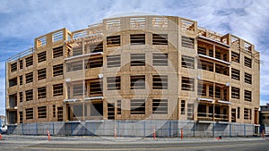 Wood framing of a new three story building at construction site