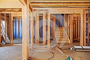 Wood framing work in progress with wood framing walls and ceiling or floor joist on new construction building