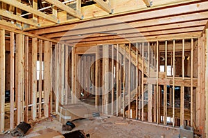 Wood framing work in progress with wood framing walls and ceiling or floor joist on new construction building