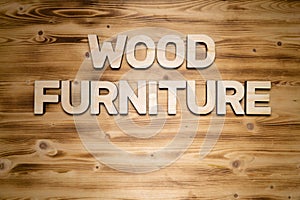 WOOD FURNITURE words made of wooden block letters on wooden board