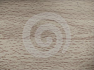 The wood grain on the floor of a table