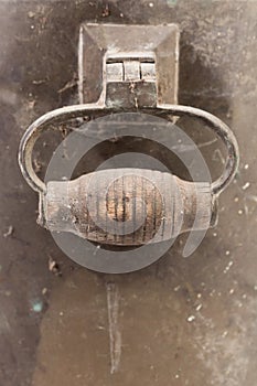 Wood handle of old dirty Russian samovar in a cobweb