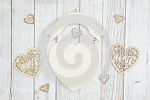 Wood heart sign on weathered whitewash textured wood