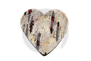 Wood heart with white background. Heart has cracks.