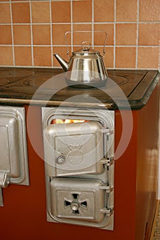 Wood heated stove warming up