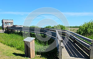 Wood house viewpoint place with wooden bridge road in nature park