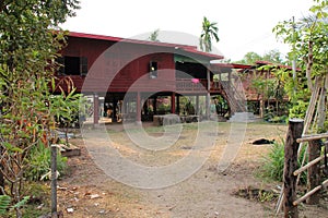 wood house in a village in khone island (laos)