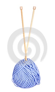 Wood knitting needles in ball of yarn, isolated