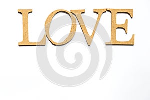Wood letter compose in word love on white background