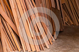 Wood lumber from sawmill material in carpenter workshop