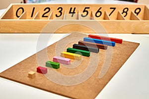 Wood Montessori material for math Cuisenaire rods photo